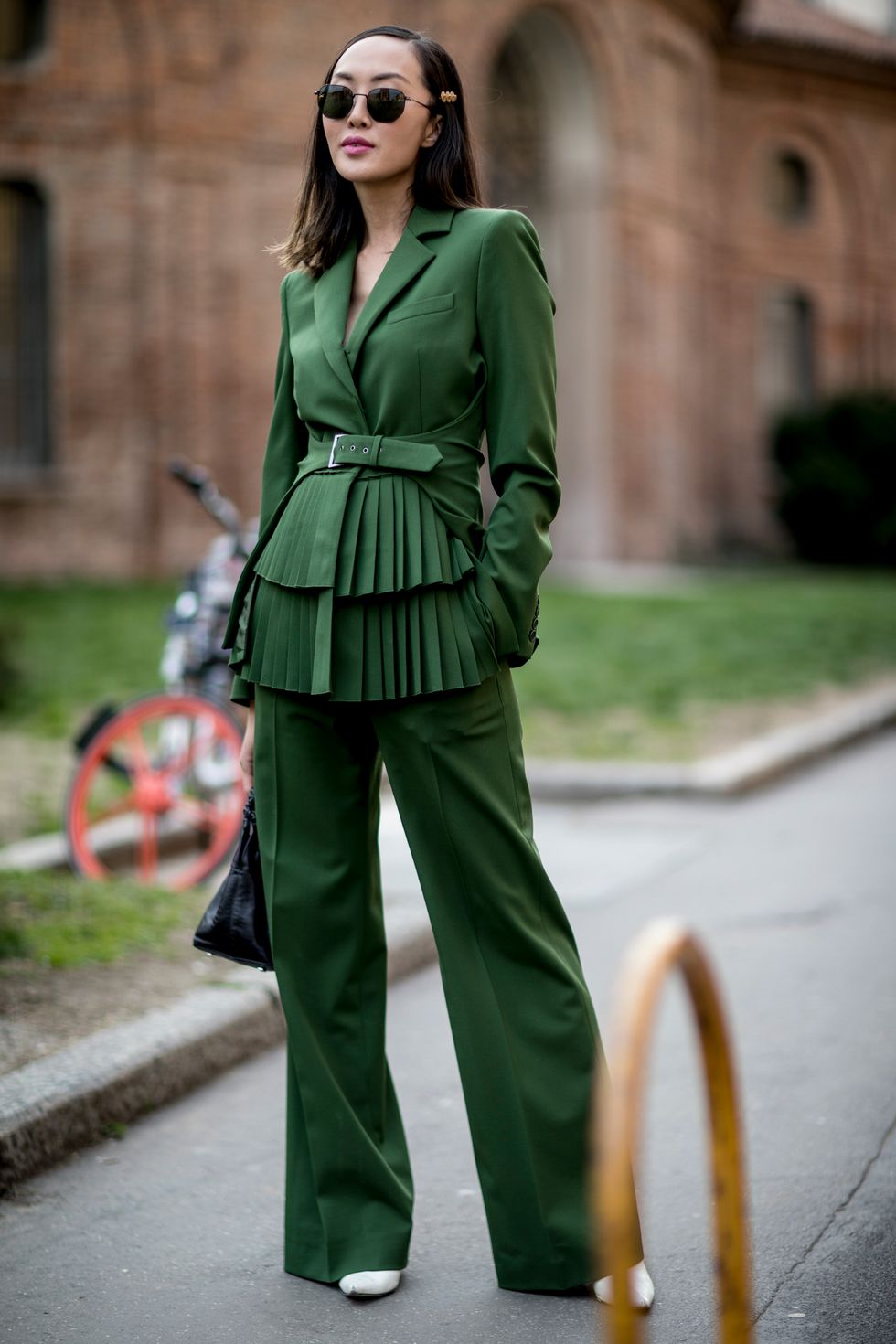 Clothing, Green, Street fashion, Fashion model, Fashion, Pantsuit, Outerwear, Suit, Waist, Trench coat, 