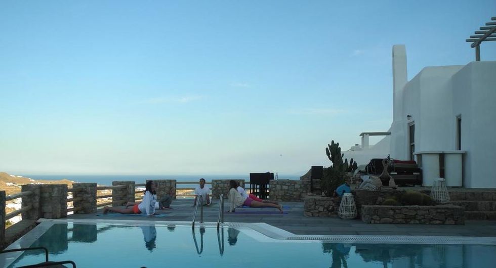 Swimming pool, Leisure, Resort, Azure, Reflection, Aqua, Resort town, Palm tree, Leisure centre, Seaside resort, 