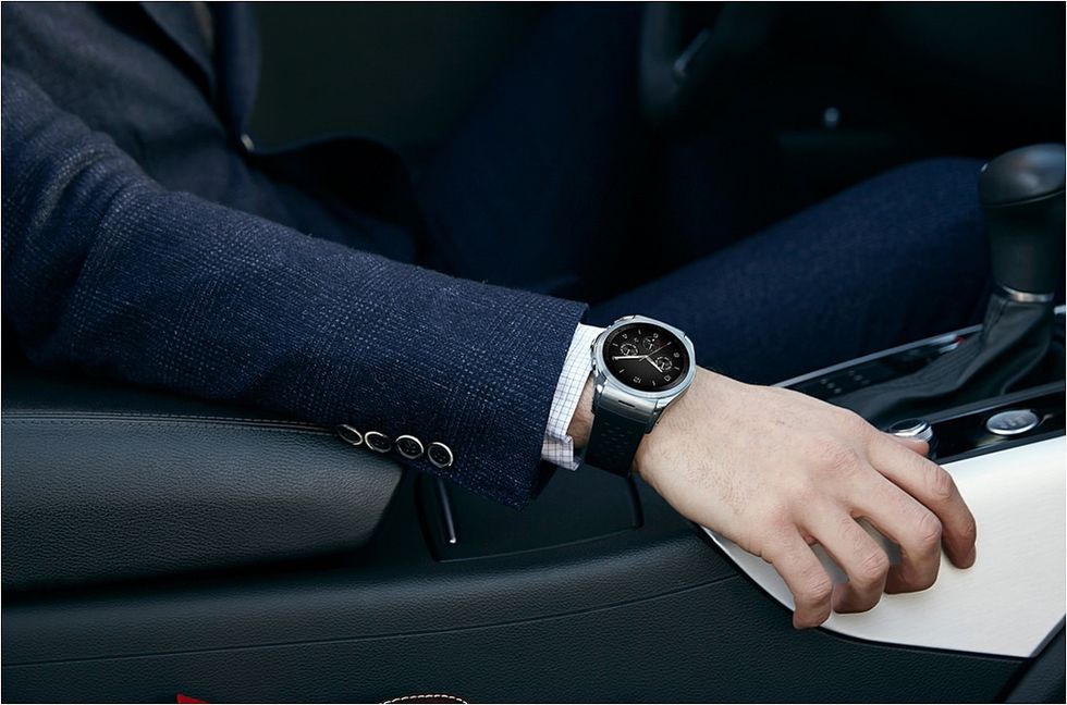 Watch, Wrist, Fashion accessory, Analog watch, Watch accessory, Luxury vehicle, Strap, Leather, Clock, Car seat, 