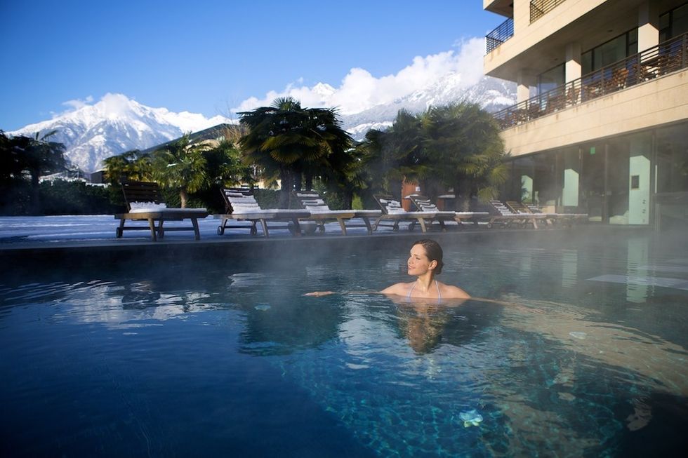 Swimming pool, Water, Leisure, Town, Resort, Reflection, Resort town, Bathing, Arecales, Palm tree, 