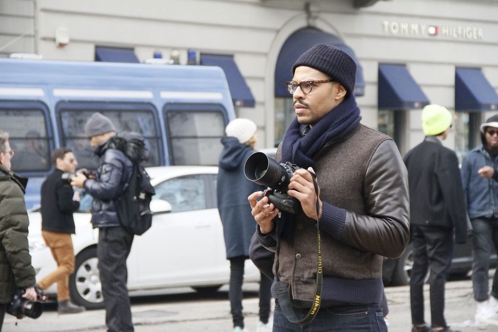 Jacket, Jeans, Camera, Cap, Hat, Single-lens reflex camera, Street fashion, Winter, Street, Headgear, 