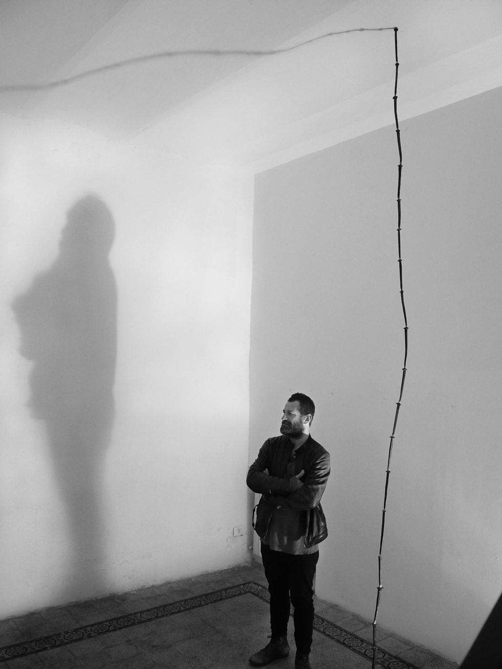 Standing, Wall, Monochrome, Grey, Monochrome photography, Black-and-white, Shadow, Visual arts, Fog, 