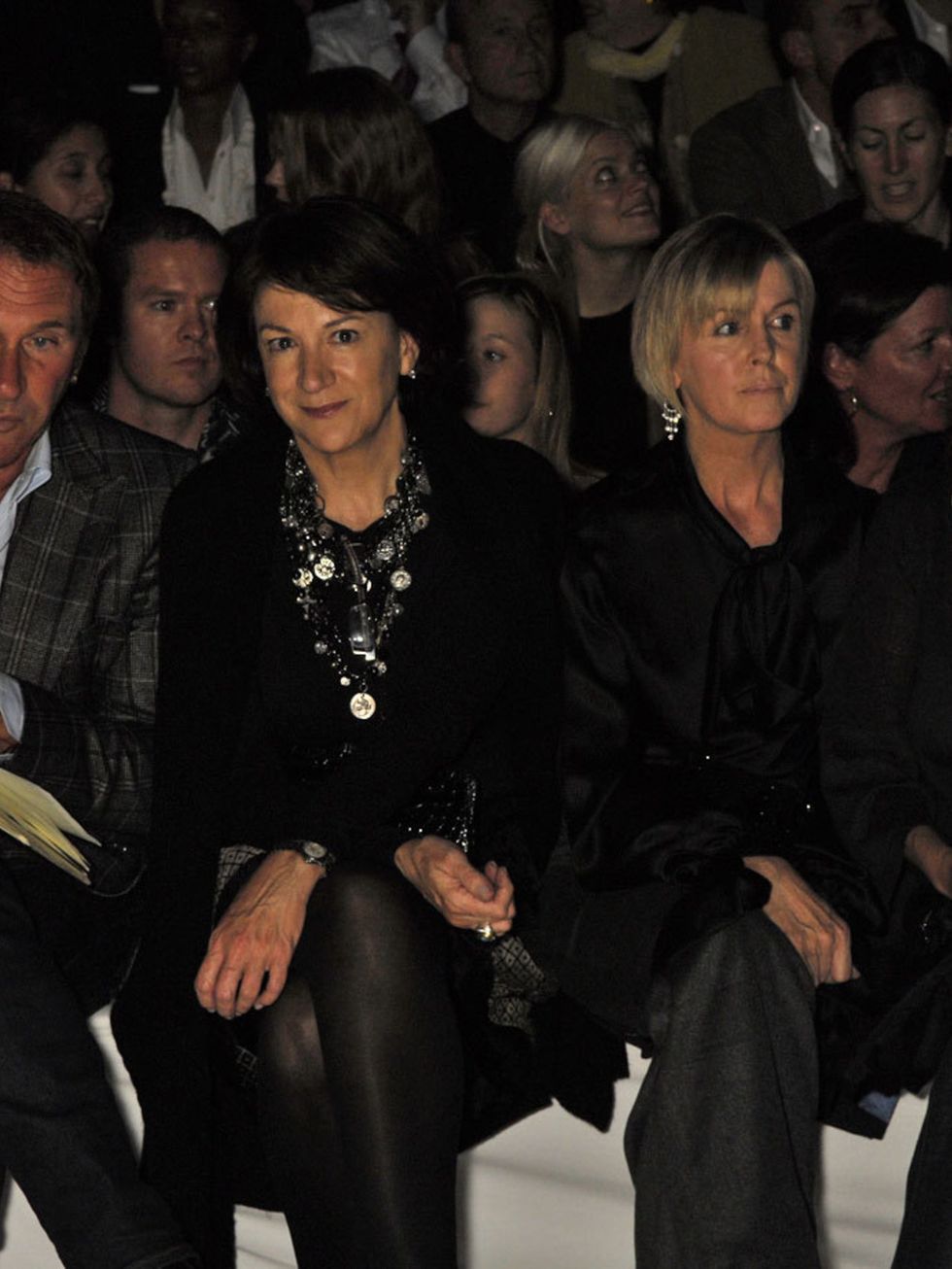 People, Audience, Crowd, Fashion, Blond, Little black dress, Fashion design, Layered hair, Suit trousers, Convention, 