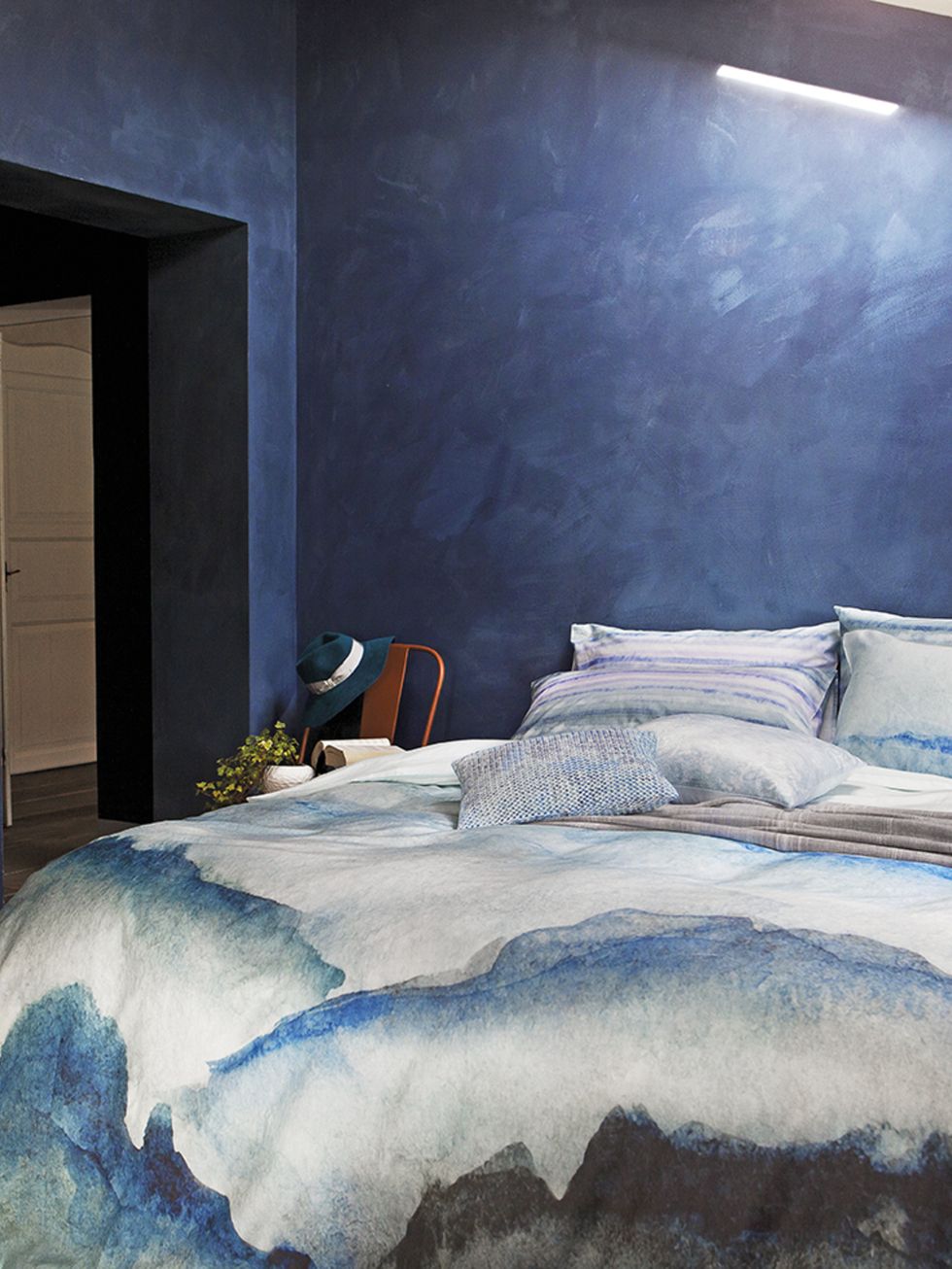 Bed, Blue, Room, Lighting, Property, Bedding, Interior design, Bedroom, Textile, Bed sheet, 