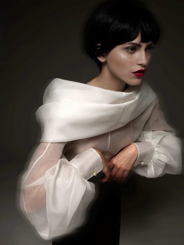 Lip, Sleeve, Shoulder, Joint, Bangs, Fashion, Fashion model, Black hair, Model, Flash photography, 