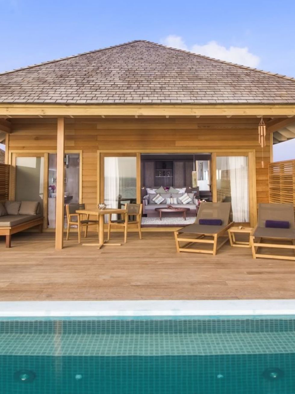 Swimming pool, Property, Real estate, Roof, House, Chair, Resort, Home, Outdoor furniture, Shade, 