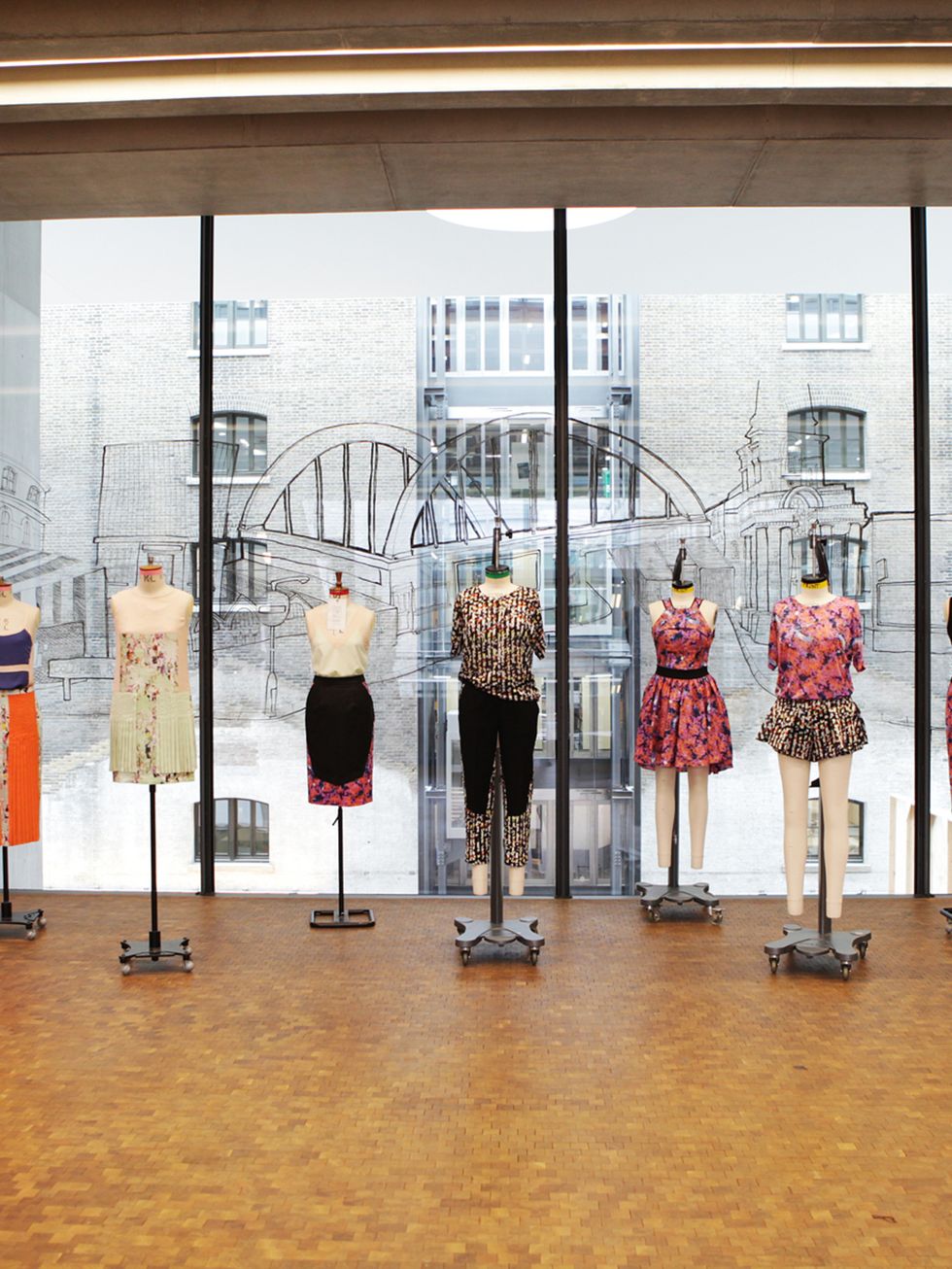 Dress, Glass, Display window, Mannequin, Display case, Retail, Transparent material, Collection, Boutique, One-piece garment, 