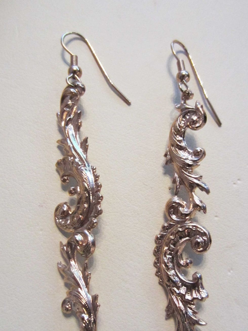 Metal, Natural material, Earrings, Art, Craft, Creative arts, Body jewelry, Silver, Bead, Jewelry making, 