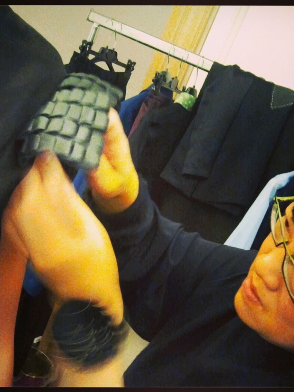 Glasses, Wrist, Comfort, Black hair, Glove, Fictional character, Couch, Sole, Foot, Toe, 