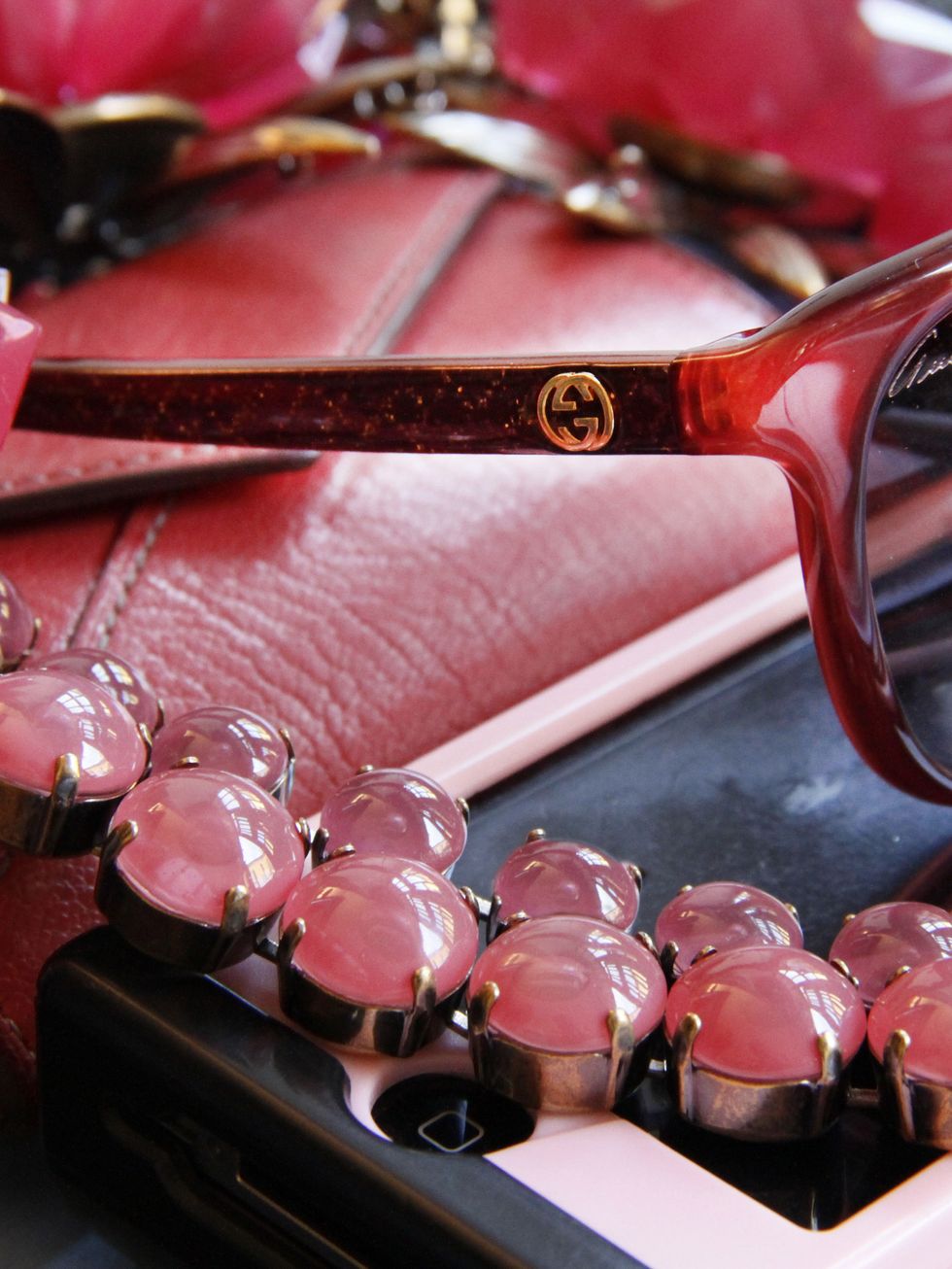 Eyewear, Vision care, Brown, Red, Pink, Carmine, Eye glass accessory, Material property, Ribbon, Still life photography, 