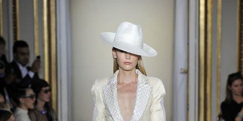 Clothing, Fashion show, Human body, Shoulder, Hat, Floor, Joint, Outerwear, Runway, Style, 