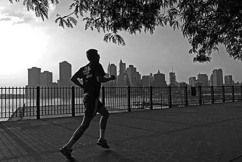 Human leg, Monochrome, Standing, Urban area, Jogging, Tower block, Running, Metropolitan area, Black-and-white, Black, 