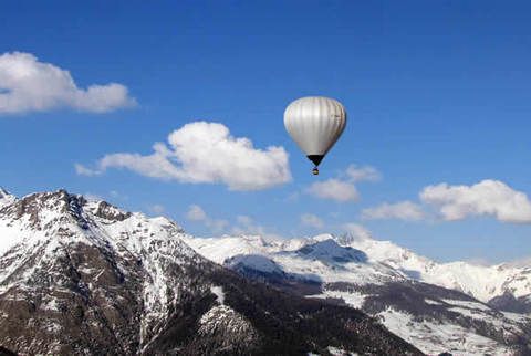 Daytime, Sky, Mountainous landforms, Mountain range, Atmosphere, Mountain, Summit, Highland, Winter, Hot air balloon, 
