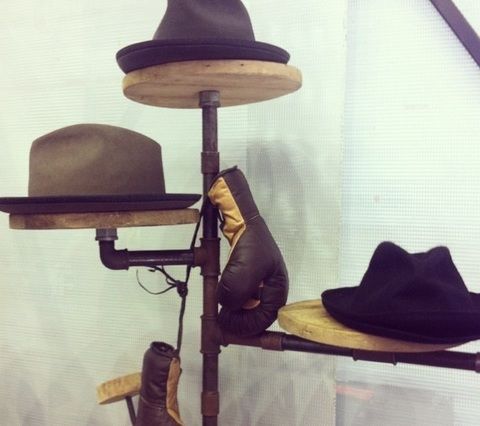 Brown, Hat, Headgear, Costume accessory, Boot, Costume hat, Iron, Still life photography, Fedora, Lighting accessory, 