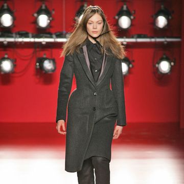 Clothing, Red, Joint, Outerwear, Fashion show, Fashion model, Coat, Style, Knee, Street fashion, 