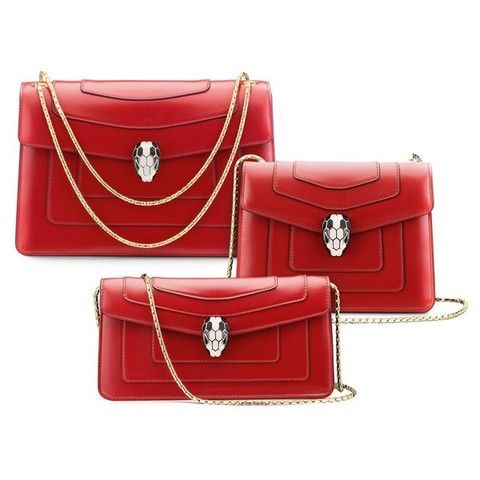 Red, Bag, Luggage and bags, Shoulder bag, Material property, Leather, Badge, Silver, Symbol, Baggage, 