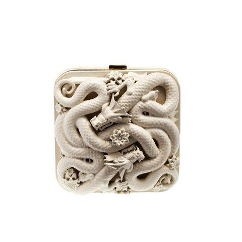 Sculpture, Beige, Visual arts, Chain, Relief, Stone carving, Creative arts, Silver, Snake, Serpent, 