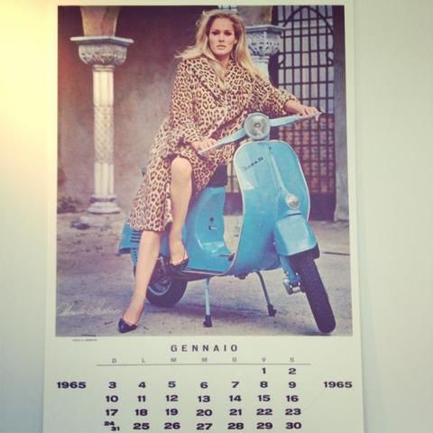 Tire, Scooter, Fender, Vintage clothing, Classic, Calendar, Retro style, Street fashion, Auto part, Moped, 