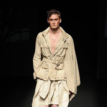 Clothing, Footwear, Sleeve, Textile, Outerwear, Fashion show, Boot, Runway, Style, Fashion model, 