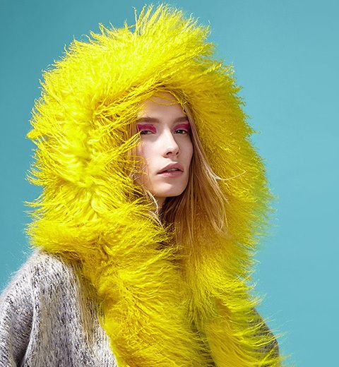 Yellow, Textile, Fur clothing, Natural material, Animal product, Fur, Electric blue, Street fashion, Long hair, Fashion model, 