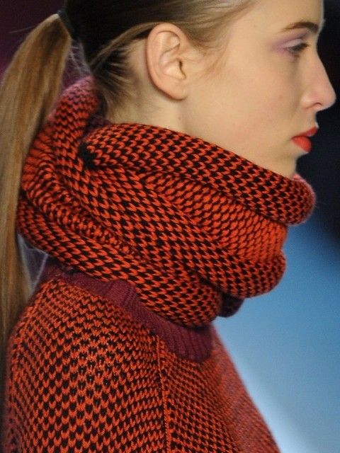 Hairstyle, Chin, Orange, Textile, Pattern, Style, Fashion accessory, Earrings, Fashion, Neck, 