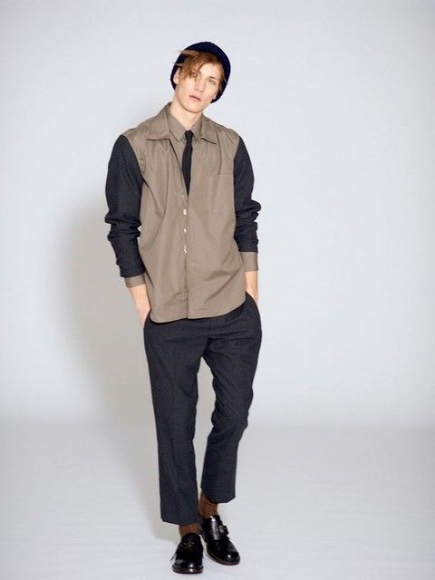 Clothing, Brown, Sleeve, Collar, Human body, Shoulder, Textile, Standing, Joint, Jacket, 