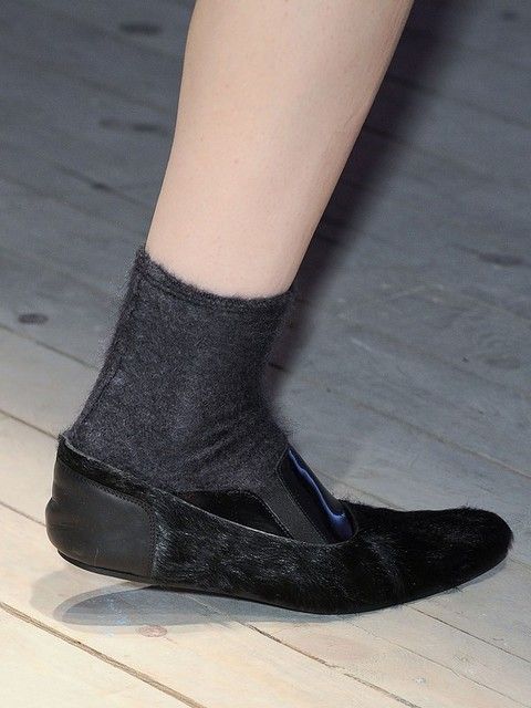 Human leg, Joint, Black, Grey, Sock, Ankle, Walking shoe, Balance, 