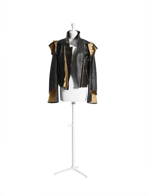Collar, Clothes hanger, Blazer, Leather, Costume design, Fashion design, Vest, Silver, Leather jacket, 