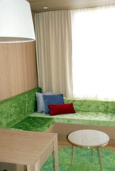 Interior design, Room, Textile, Flooring, Table, Interior design, Coffee table, Window treatment, Curtain, Teal, 