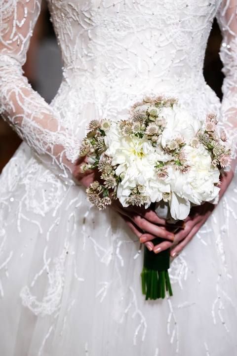 Yellow, Petal, Bridal clothing, Bridal accessory, Photograph, Dress, White, Bouquet, Wedding dress, Cut flowers, 