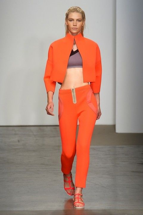 Shoulder, Joint, Style, Fashion show, Orange, Fashion, Waist, Runway, Fashion model, Thigh, 