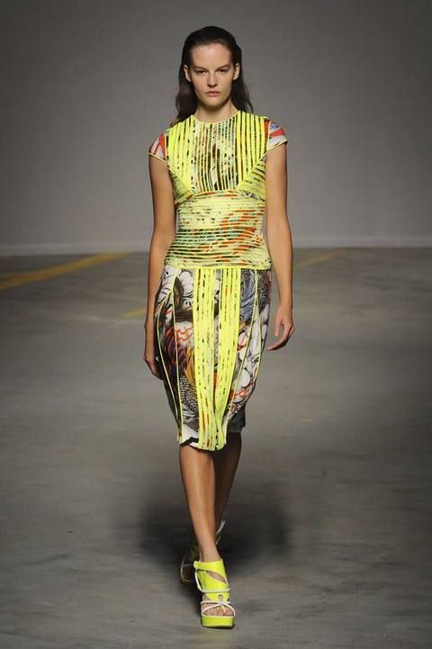 Clothing, Yellow, Fashion show, Shoulder, Joint, Runway, Style, Fashion model, One-piece garment, Waist, 