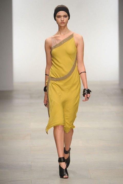 Brown, Yellow, Shoulder, Human leg, Joint, Dress, Floor, Style, Waist, One-piece garment, 