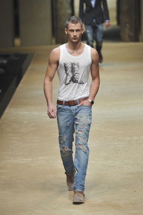 Clothing, Denim, Trousers, Jeans, Shoulder, Sleeveless shirt, Standing, Joint, Style, Street fashion, 