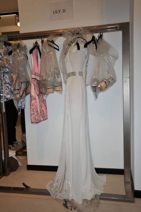 Dress, Clothes hanger, One-piece garment, Fashion, Day dress, Gown, Wedding dress, Mannequin, Ivory, Bridal party dress, 