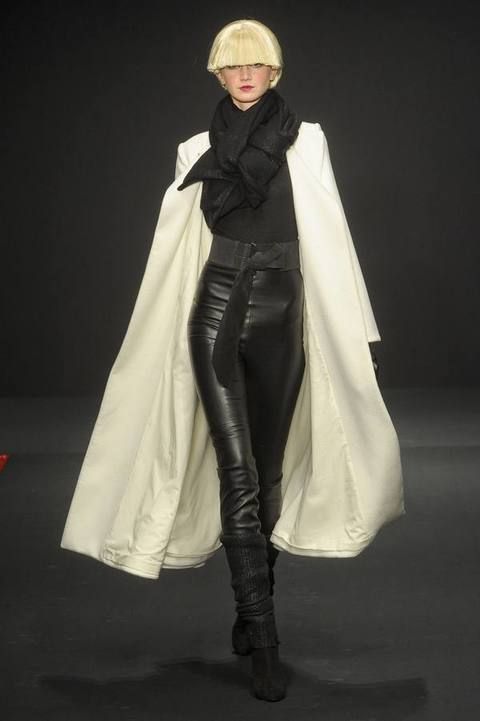 Textile, Style, Costume design, Boot, Fashion, Fashion model, Knee-high boot, Costume, High heels, Haute couture, 