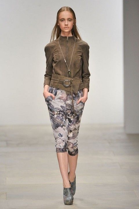 Clothing, Brown, Sleeve, Human body, Shoulder, Joint, Outerwear, Style, Camouflage, Fashion show, 