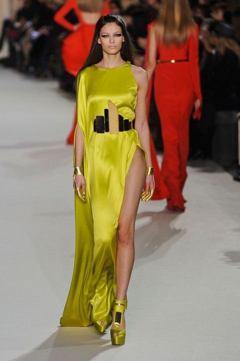 Clothing, Yellow, Fashion show, Shoulder, Joint, Red, Fashion model, Dress, Runway, Waist, 