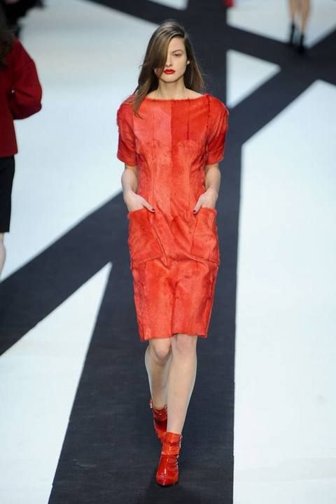 Leg, Fashion show, Human leg, Shoulder, Dress, Joint, Red, Runway, Fashion model, Style, 