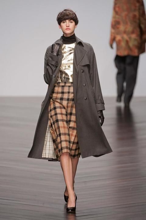 Clothing, Footwear, Leg, Sleeve, Human body, Fashion show, Textile, Joint, Outerwear, Coat, 