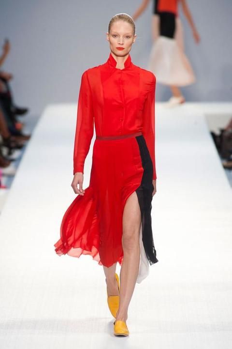 Fashion show, Event, Shoulder, Dress, Runway, Joint, Red, Outerwear, Fashion model, Style, 