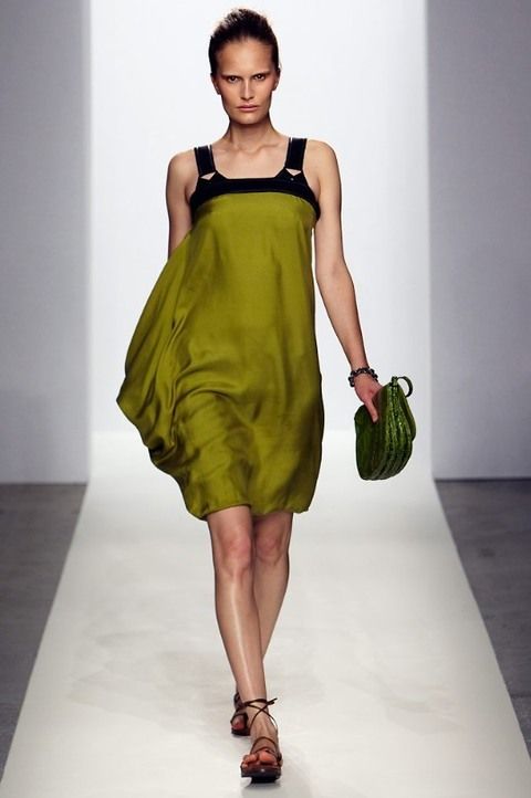 Clothing, Leg, Human leg, Green, Shoulder, Dress, Joint, Sleeveless shirt, Style, One-piece garment, 