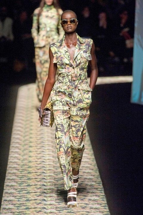 Fashion show, Human body, Military camouflage, Camouflage, Runway, Style, Fashion model, Soldier, Pattern, Fashion, 
