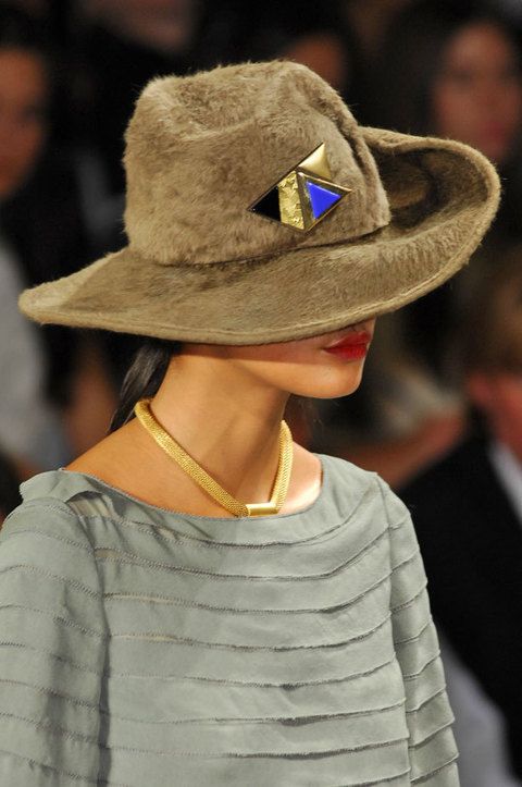 Lip, Hat, Chin, Shoulder, Fashion accessory, Style, Headgear, Costume accessory, Sun hat, Street fashion, 