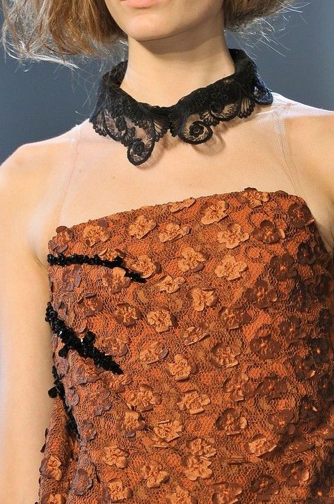 Clothing, Brown, Collar, Amber, Fashion, Neck, Pattern, Jewellery, Costume accessory, Bow tie, 