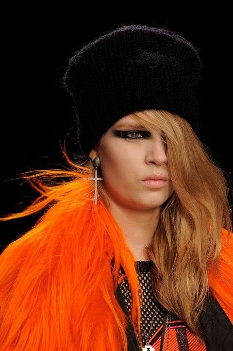 Hairstyle, Eyebrow, Orange, Style, Headgear, Eyelash, Costume accessory, Fashion, Hair accessory, Fur, 