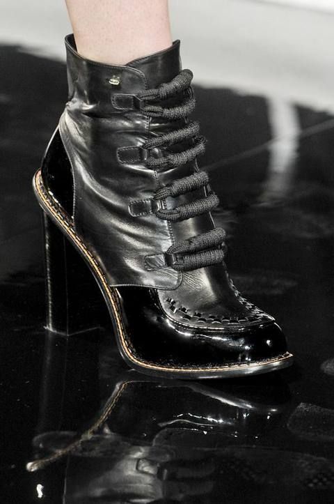 Boot, Black, Leather, Material property, Still life photography, Silver, High heels, Foot, Synthetic rubber, 
