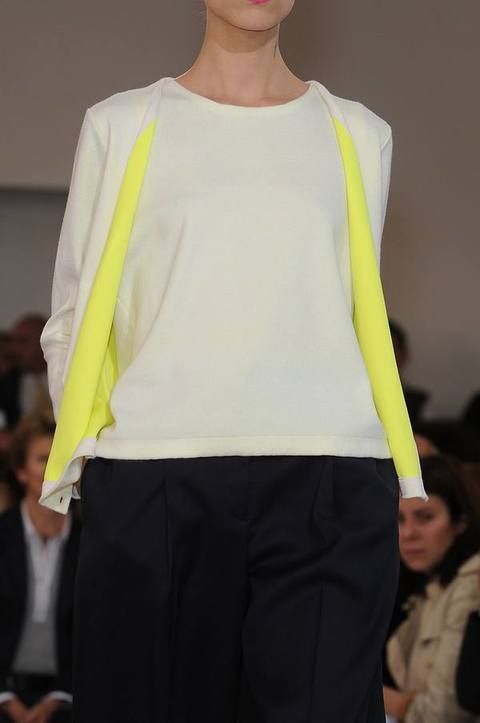 Yellow, Sleeve, Shoulder, Standing, Joint, Waist, Suit trousers, Fashion show, Fashion, Neck, 