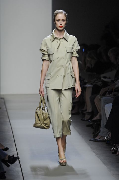 Clothing, Brown, Sleeve, Shoulder, Joint, Outerwear, Fashion show, Style, Fashion model, Bag, 