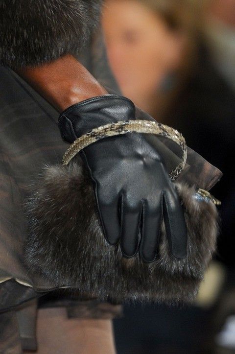 Human, Leather, Liver, Street fashion, Fur, Horse tack, Glove, Working animal, Safety glove, Collar, 